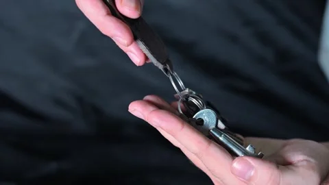 Hand Receiving House Keys on Keychain Real Estate Transfer Concept Stock Footage 337785171
