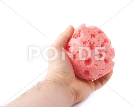 Hand with red bathing sponge isolated over the white background Stock Photos