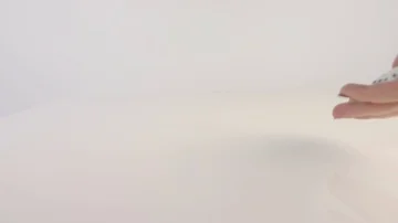 Hand with red painted nails throwing dice on a white background Stock Footage 85364038