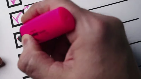 Hand with a red pen ticks checkbox marks... | Stock Video | Pond5