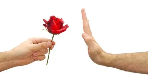 Hand refuses a flower or declines gift isolated on white background Stock Photos