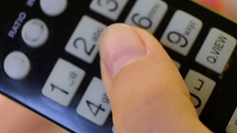 Hand with remote control Stock Footage 93330620