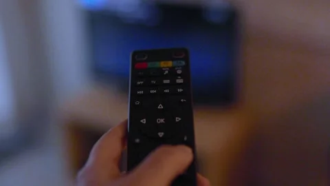 Hand with remote control Stock Footage 313142684