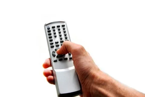 Hand with remote control on the isolated background Stock Photos