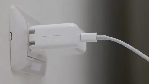 Hand remove Electric plug on socket. Electrical equipment, electrical wires and  Stock Footage 152754177