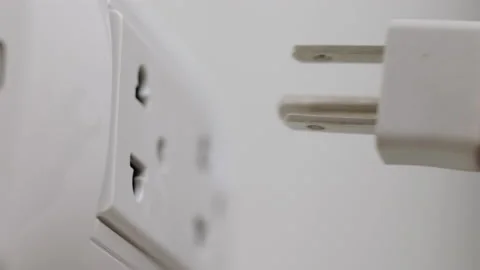 Hand remove Electric plug on socket. Electrical equipment, electrical wires and  Stock Footage 152754758