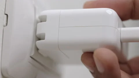 Hand remove Electric plug on socket. Electrical equipment, electrical wires and  Stock Footage 152754884