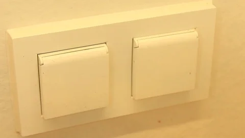 Hand remove plug wire with protection Stock Footage 86414198