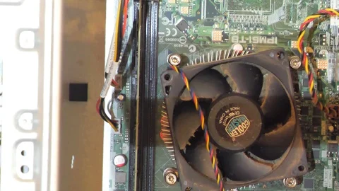 A hand removes ram from an old pc computer Stock Footage 116654451