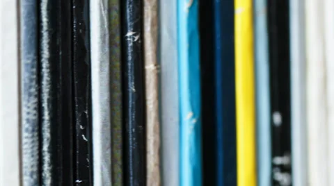 Hand removes a record from an audio library 스톡 동영상 36369138