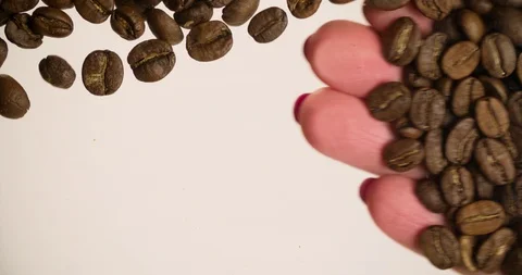Hand removing coffee beans Coffee Background Slow motion bottom view 4K Stock Footage 103642253