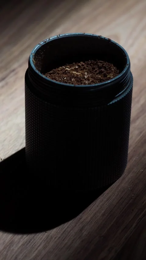 Hand Removing Coffee Grinder Container Dark 4K Stock Footage 325389381