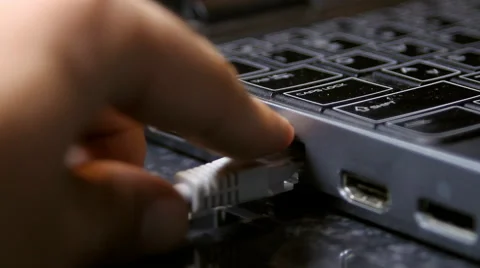 Hand Removing Ethernet Cable From Laptop, Media, Technology, Data, Side Shot Stock Footage 41990359