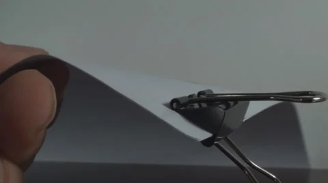 Hand Removing Paper Clip, Documents, Papers, White, Extreme Close Up Shot Stock Footage 43969160