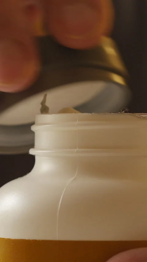 Hand Removing Pill From Bottle Close View. Vertical. Stock Footage 296685448