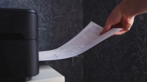 Hand Removing Printed Document From Office Printer Stock Footage 328053346