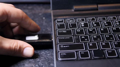 Hand Removing USB Thumb Drive From Laptop, Media, Technology, Storage, Top View Stock Footage 41990069