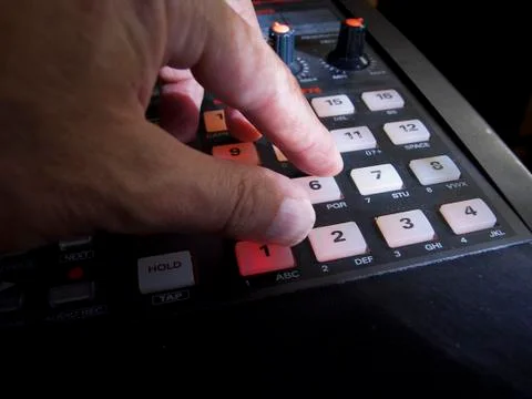 Hand on retro sampler 写真素材