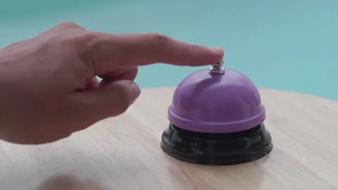 Hand ringing in service bell on a blurred background Stock Footage 173718074