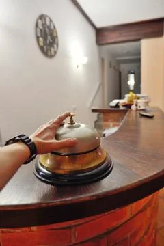 Hand ringing in service bell Stock Photos