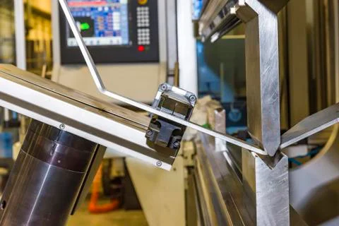 Hand robot working automatic cutting and bending metal Stock Photos