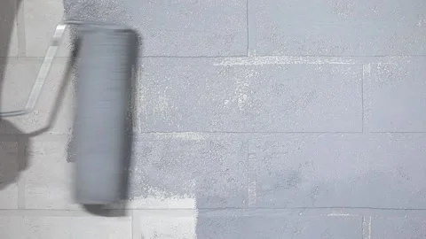 Hand with a roller paints the wall 스톡 동영상 221213254