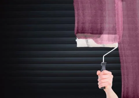 Hand with roller pining the screen  in front of blind Stock Photos