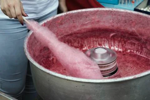 Hand rolling cotton candy Stock Photos