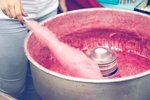 Hand rolling cotton candy Stock Photos