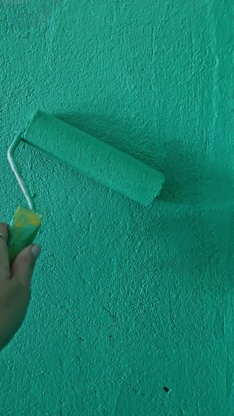 Hand Rolling Green Paint Rough Wall Stock Footage 318344441
