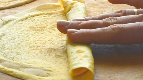 Hand rolls pancake Stock Footage 59662204
