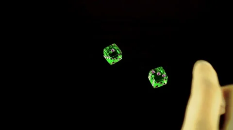 Hand rolls then grabs a pair of dice for gambling Vidéo 37089706