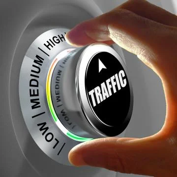 Hand rotating a button and selecting the level of traffic. Illustrazione stock