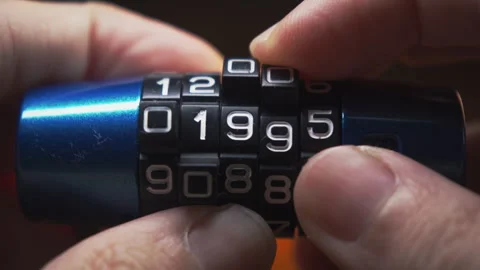 Hand Rotating Dials on a Combination Padlock number of 20th century to 2030. Stock Footage 314172447