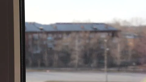 Hand in a rubber glove washes the window. High quality FullHD footage. Stock Footage 146273111