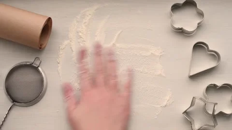 Hand rubs flour on the kitchen table Video stock 167545767
