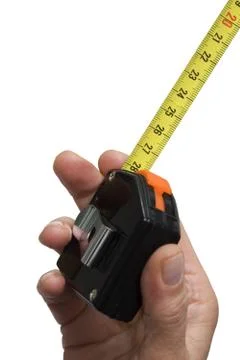Hand with a rule Stock Photos