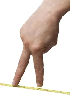 Hand with a rule Stock Photos