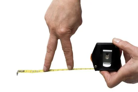 Hand with a rule Stock Photos