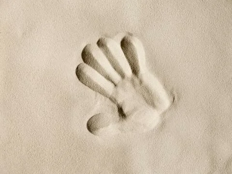 Hand in the sand Stock Photos