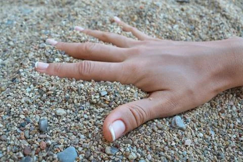 Hand on the sand Stock Photos