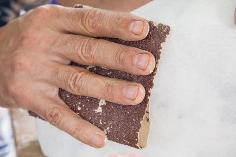 Hand sanded piece of white marble in the studio Stock Photos