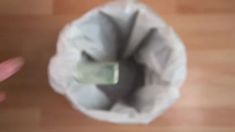 Hand Sanitiser Dropped In Bin Stock Footage 157174117