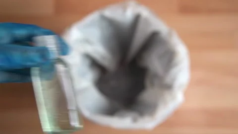 Hand Sanitiser Dropped In White Bin Stock Footage 157174113
