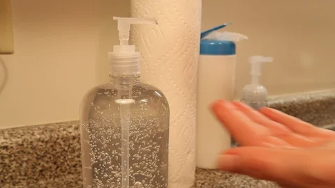 Hand Sanitizer to Prevent the Spread of Germs Coronavirus Stock Footage 126361639