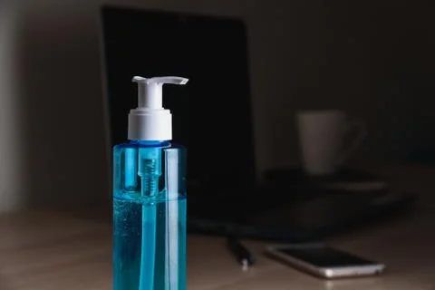 Hand sanitizer on working table Stock Photos