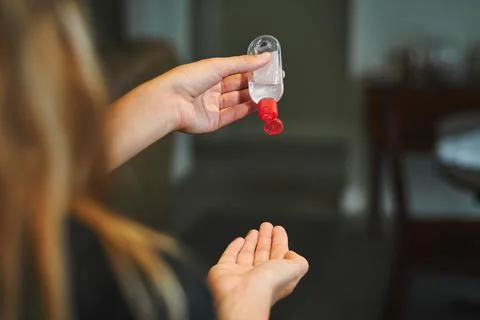 Hand sanitizing at home Stockfoto's