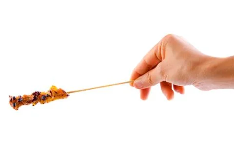 Hand with satay Stock Photos