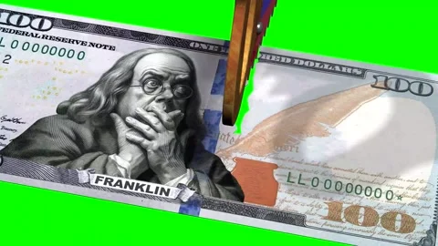 A hand saw saws the US dollar. Stock Footage 245445038