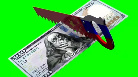 A hand saw saws the US dollar. Stock Footage 245445043